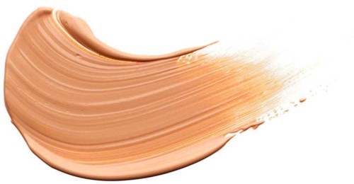 En beigefärgad makeup- eller hudvårdsprodukt som svepts med en borste eller finger, och lämnar böjda spår på vit bakgrund.