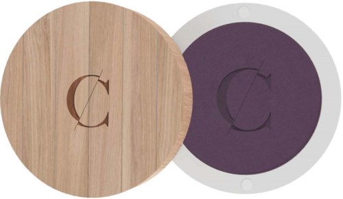 Two round boards, one wooden and one purple, with a 'C' logo in the center. The boards are placed side by side.