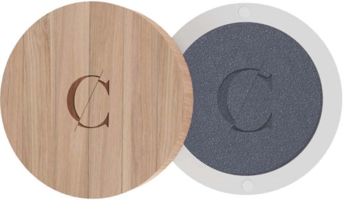 Two round coasters, one with a wood finish and the other with a black textured surface, both have a 'C' logo.