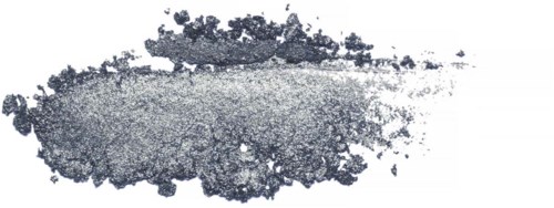 Gray powder spread out on a black background, irregular shape, some small scattered particles.