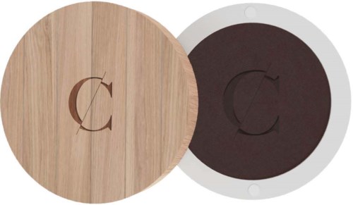 A round wooden coaster with a logo cutout and a round black coaster with a similar logo.