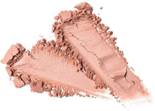 A broken pinkish powder, shaped like two triangles, scattered on a white background.