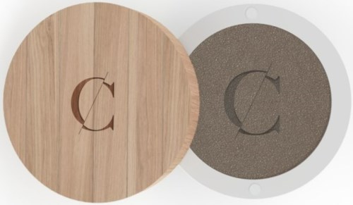 Logo with a letter C and a curved line, displayed on wood and stone background.