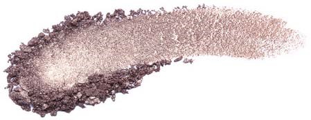 A brown and beige metallic-looking streak, possibly of eyeshadow or makeup.