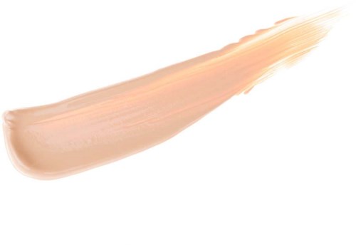 En beige löpning av väldoftande makeup eller kräm med en jämn, blandad del och en sträng som sträcker sig utåt.