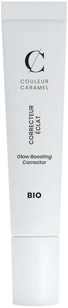 En vit tub med svart och grå text som visar en glow-boosting concealer för huden, märkt 'COULEUR CARAMEL'.