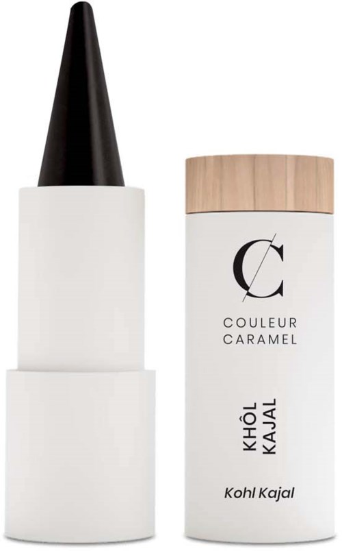 En vit flaska med en svart spetsig lock och en cylindrisk behållare med en trälock, märkt "Kohl Kajal" och "Couleur Caramel."