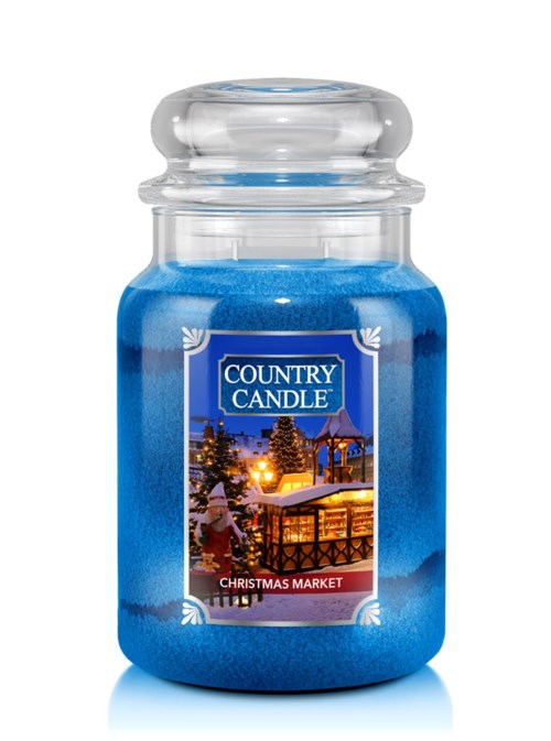 Ett blått doftljus i glasflaska med texten "Country Candle Christmas Market."