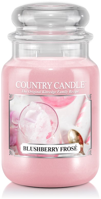 Ljus rosa stearinljus märkt 'Blushberry Frosé' med countrystil och glasburk.