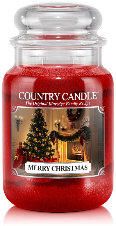 En röd ljuslykta med en julscen av ett pyntat träd och öppen spis, märkt "Country Candle" och "God Jul."