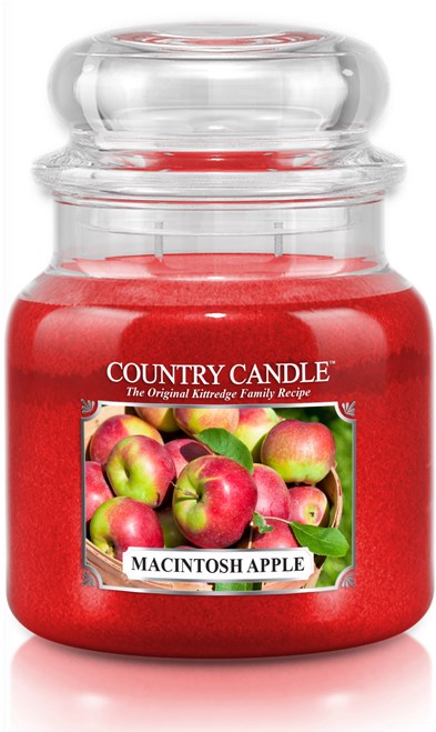 Röst ljus märkt 'Macintosh Apple' med en bild på äpplen och gröna blad på framsidan.