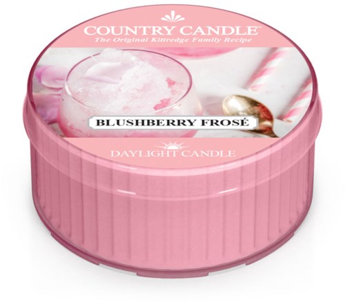 En rosa rund ljusbehållare med etiketten 'Blushberry Frosé' och en sked med en rosa dryck.