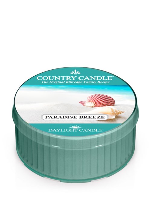 En tealfärgad ljusburk med en etikett som visar ett snäcka och texten "Country Candle" och "Paradise Breeze."