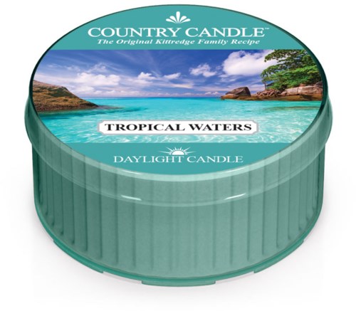 Rund behållare i teal med ett omslag som visar en strandscen, texten säger "Tropical Waters" och "Daylight Candle."