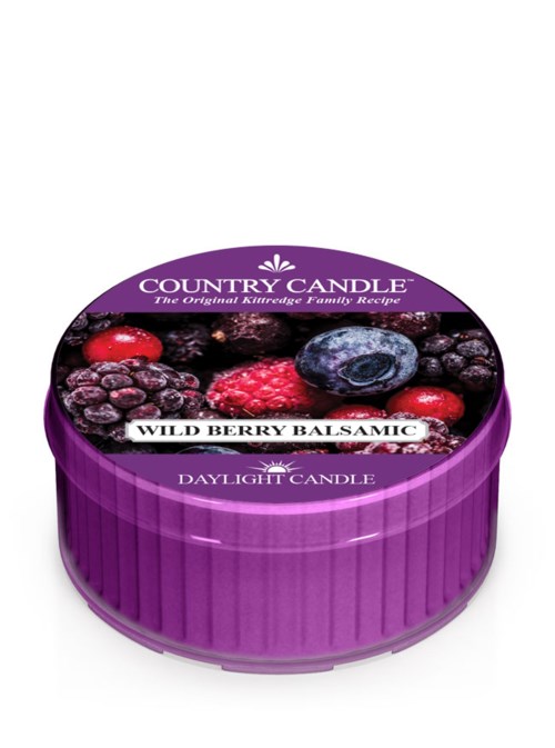 Lila ljusbehållare med en etikett som visar bär, märkt "Wild Berry Balsamic," från Country Candle.