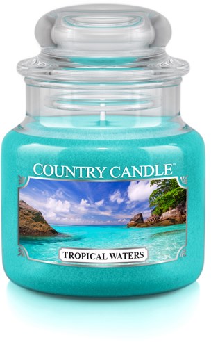 En stor blå ljus i glasburk märkt 'Tropical Waters' med en strandscen på framsidan.