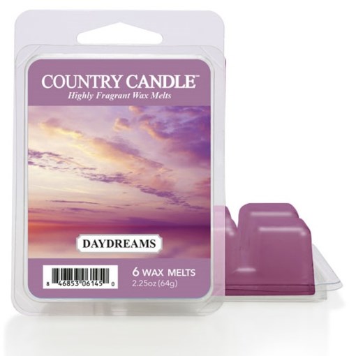 En vokslys pakke med solnedgangshimmel, mærket 'Country Candle,' 'Daydreams,' 6 blokke, lilla farvetema.