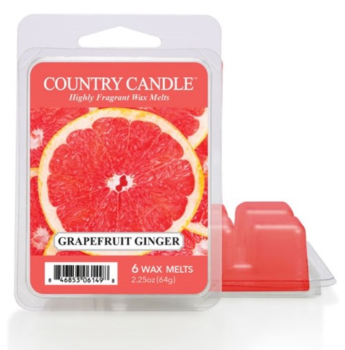 Een waxgeur in een container gemerkt 'Country Candle' met geur van grapefruit en gember, toont de smaakdetails van het product.