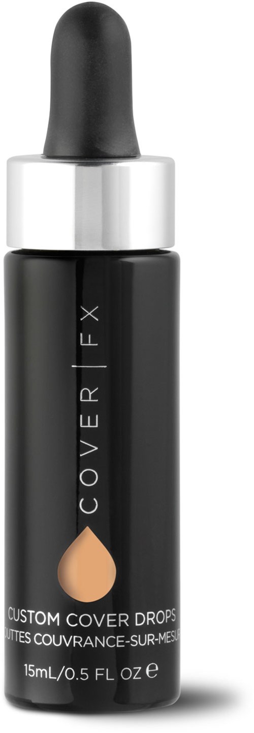 En svart flaska med droppkork, märkt 'COVER FX', som innehåller flytande makeup eller concealer.