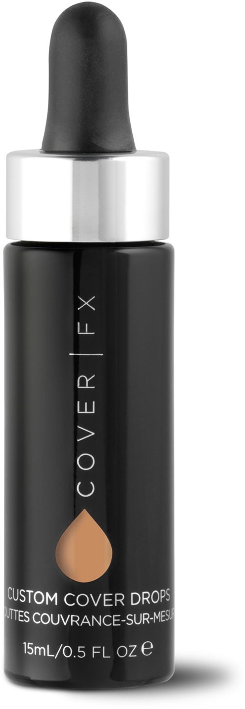 En liten svart flaska med dropplock, märkt 'Cover FX', innehåller en kosmetisk produkt som heter 'Custom Cover Drops'.