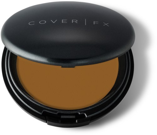 Rund svart kompakt med gul puder inuti, märkt 'COVER FX' på locket.