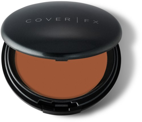En rund kompakt med svart lock och orange puder inuti, märkt 'COVER FX'.
