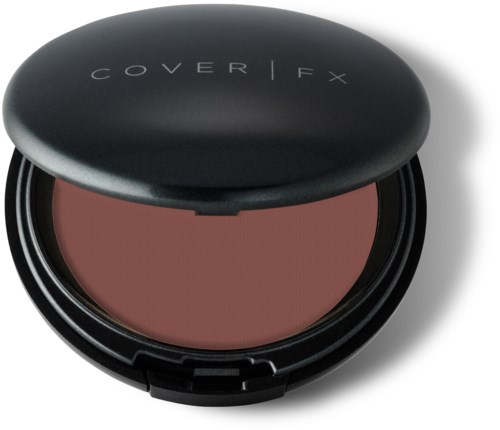 En rund svart kompaktskräm med märket 'Cover FX' och rosa puder inuti.