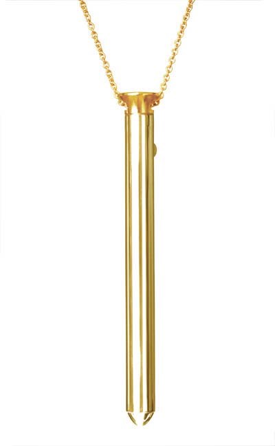 A gold necklace with a long, vertical pendant resembling a pen or stylus.