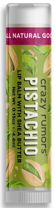 En gröngul och rosa läppbalsamrör märkt 'Pistachio' med bilder av pistagenötter och blad.