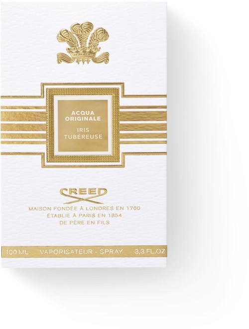 Luxury perfume box with gold accents, a crest, and French text describing the fragrance and brand details.