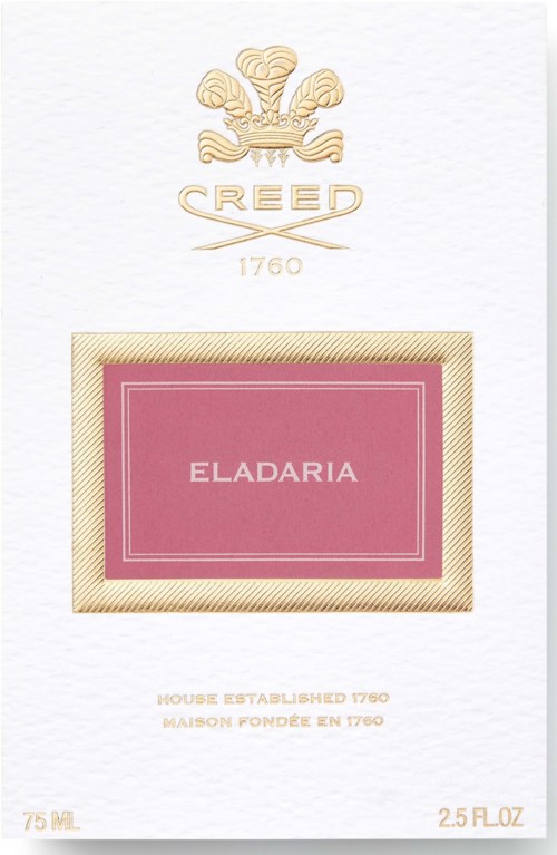 En parfymförpackning med en guldförgylld emblem, varumärket 'CREED', en rosa etikett med 'ELADARIA' och information om storlek och ursprung.
