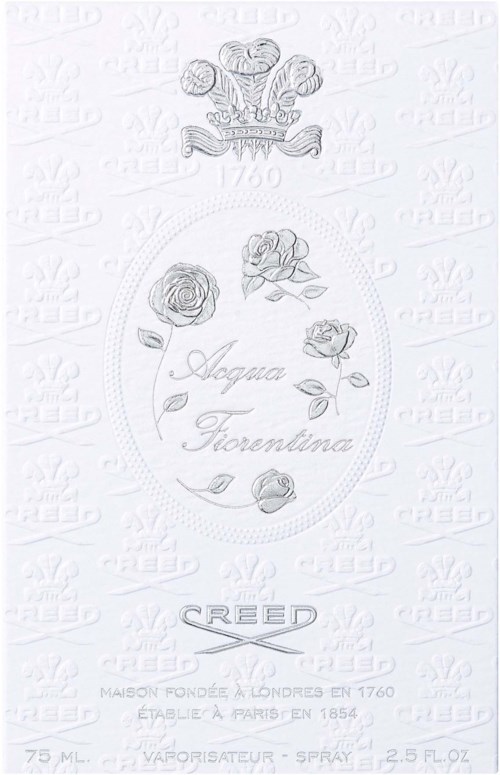 A floral design with roses and a crown, text with a name, and the brand Reed. It mentions London, Paris, and a spray.