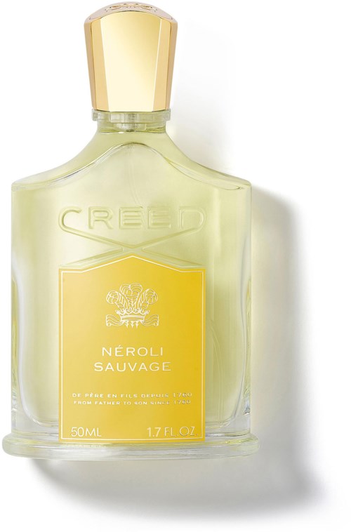 En ljusgul parfyllfata med guldlock från Creed's Neroli Sauvage-serien.
