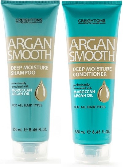 To hårpleieprodukter, sjampo og balsam, i turkise flasker med beige merker, har en vann dråpe-ikon og tekst.
