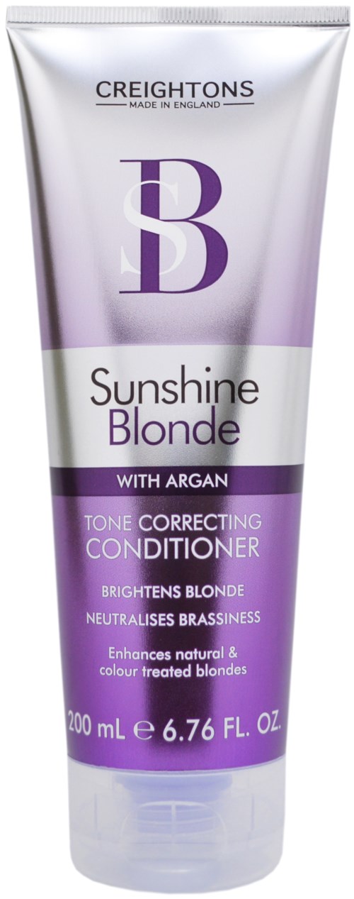 En tube med blond hårbalsam i lilla og hvite emballasje, 200 ml, for å forbedre og nøytralisere gult.