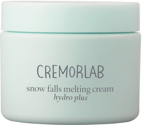 En ljusfärgad burk märkt Cremorlab snow falls melting cream hydro plus, används för hudvård eller kosmetiska ändamål.