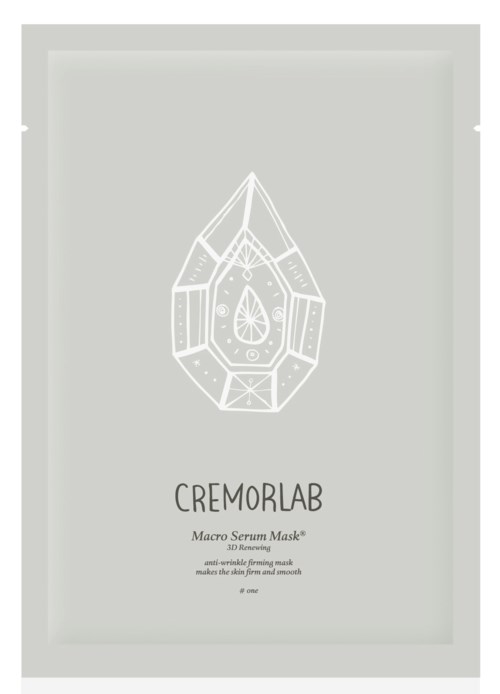 Ett ljusgrått paket med en vit geometrisk droppdesign, märkt 'Cremorlab Macro Serum Mask.'