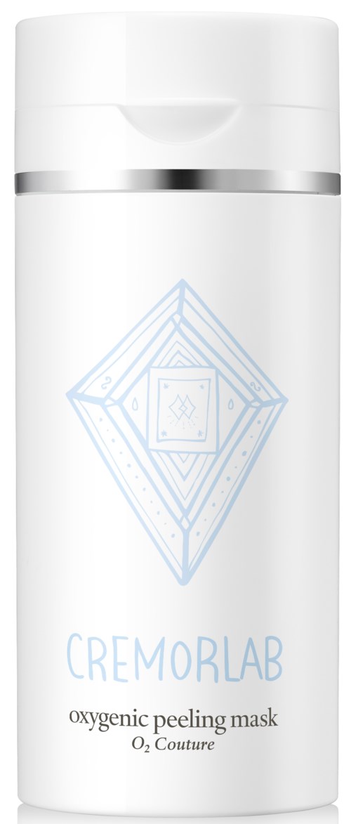 Vit flaska med blå geometrisk design, märkt "CREMOBL" och säger "oxygenic peeling mask" för hudvård.