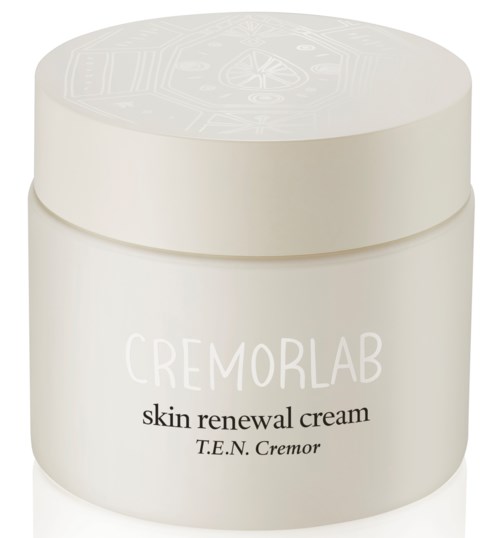 En vit burk med lock märkt 'Cremorlab skin renewal cream' med minimalistisk design.