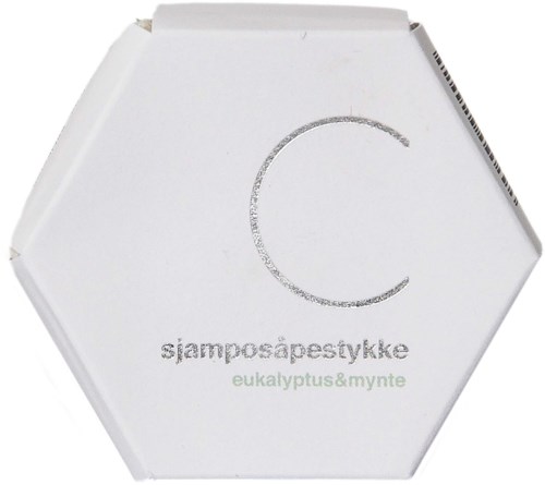 Valkoinen kuusikulmio-pakkaus, jossa lukee "sjampósápeystykk" ja "eucalyptus & minttu".