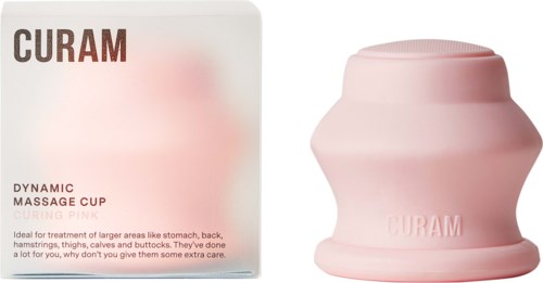 A pink massage cup next to a box labeled 'Curam' for muscle therapy.