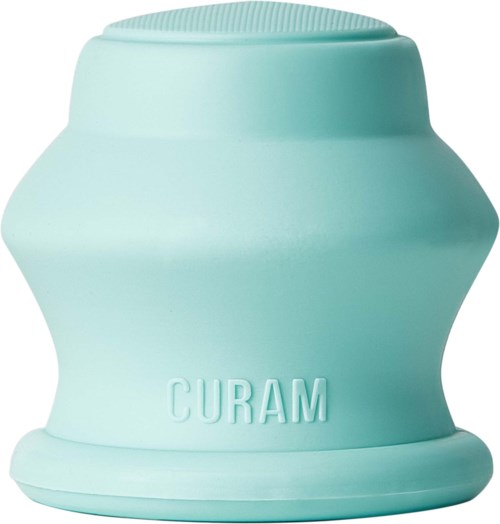 A light blue, rounded container with the word 'CURAM' on it, possibly a cosmetic or skincare product.