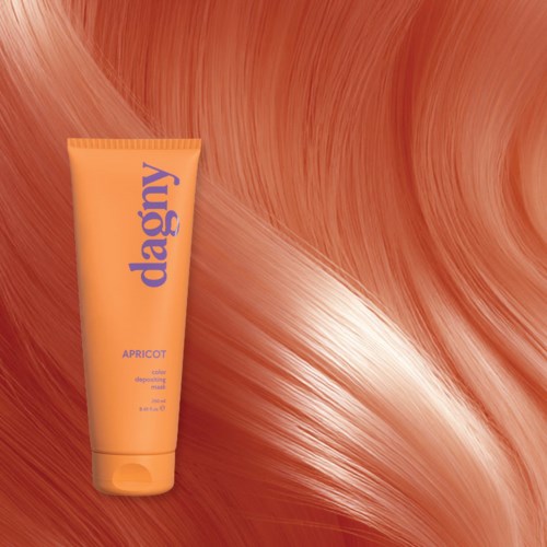 A peach-colored tube labeled 'dagy' on colorful, swirling peach and cream background.