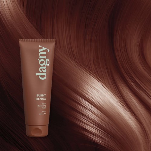 A tube of Daogy Burnt Sienna hair color with shiny, smooth hair strands behind it.
