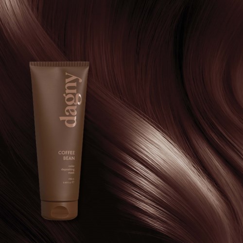 A coffee-colored hair mask tube beside glossy, wavy brown hair. The brand name is deogy.