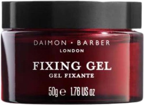 Ein kleiner roter Behälter mit schwarzem Deckel enthält Fixierungsgel von Daimon Barber London.