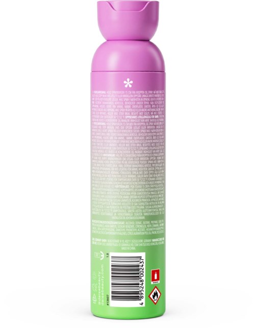 En lyserød og grøn flaske med små tekster og stregkode, sandsynligvis en hudpleje- eller brusebadprodukt.