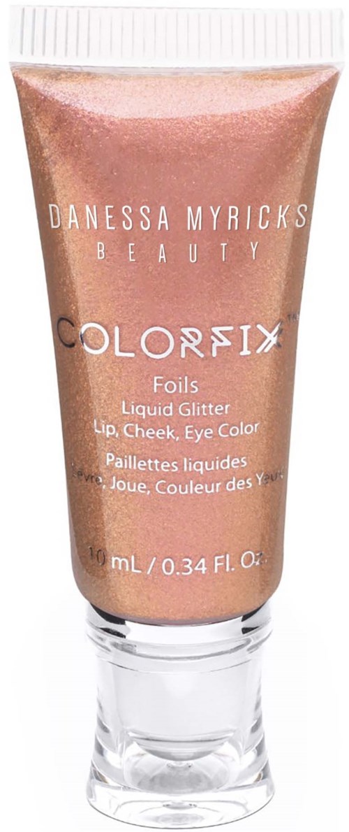 A tube of liquid glitter makeup for lips, cheeks, and eyes in a pinkish shade.