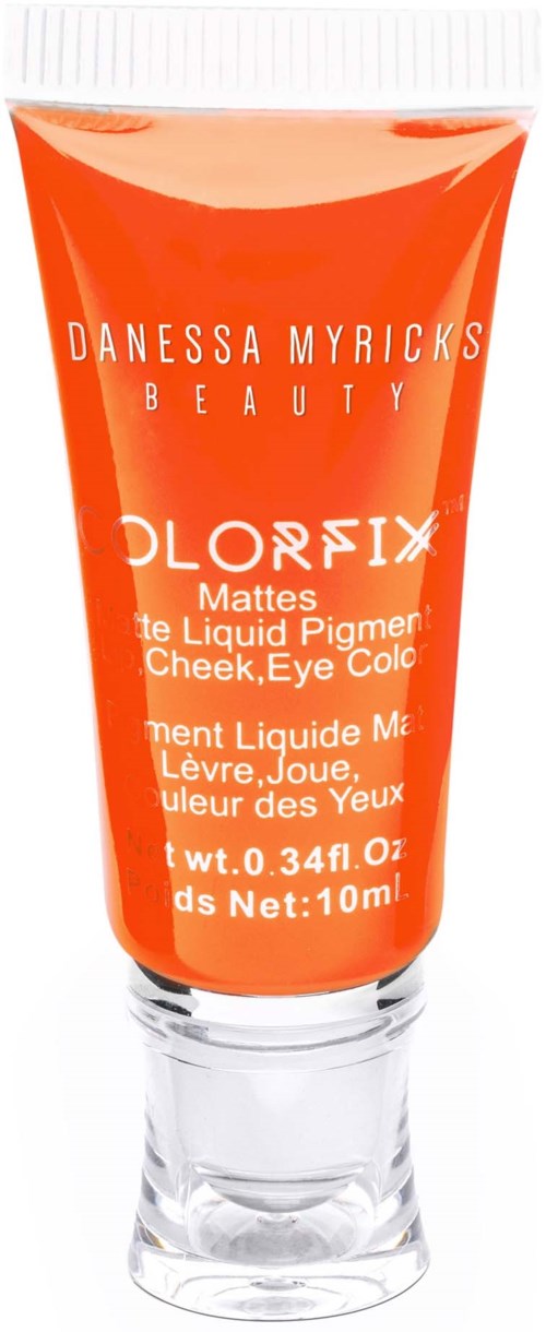 Pomarańczowa tubka z białą nakrętką, oznaczona 'Danessa Myricks Beauty' i 'Colorfix', do policzków i koloru oczu.