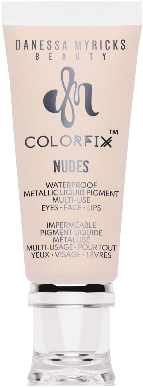 Ett sminkprodukt i tub märkt 'Color Fix Nudes' av Danessa Myricks, för ögon, ansikte, läppar, vattentätt och mångsidigt.